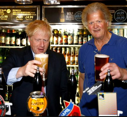Prime Minister Boris johnson and Tory doner Wetherspoons owner Tim Martin